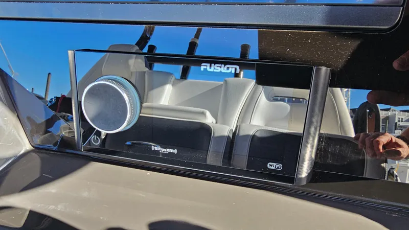 Slide: The Image of Fusion stereo system on 2021 Blackfin 332 CC boat dashboard. - 25