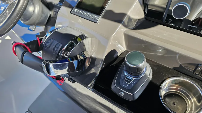 Slide: The Image of 2021 Blackfin 332 CC helm with modern controls and steering wheel. - 26