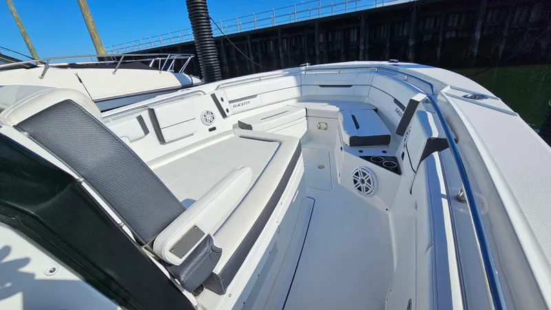 Slide: The Image of 2021 Blackfin 332 CC boat interior with spacious seating and modern design. - 34