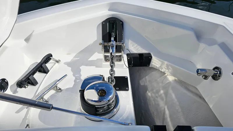 Slide: The Image of 2021 Blackfin 332 CC boat anchor system with chain and winch. - 43