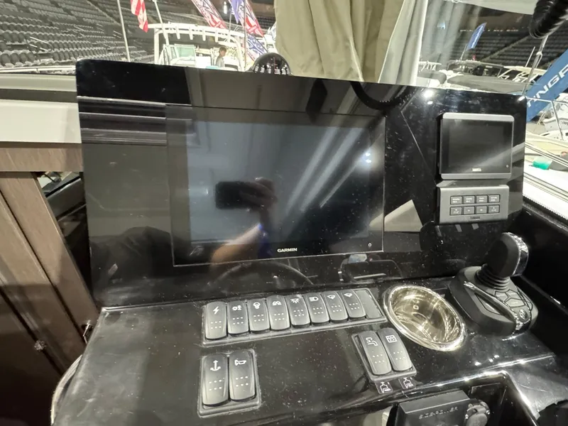 Slide: The Image of Control panel of 2025 Jeanneau NC 895 Sport Series 2 boat with navigation display. - 10