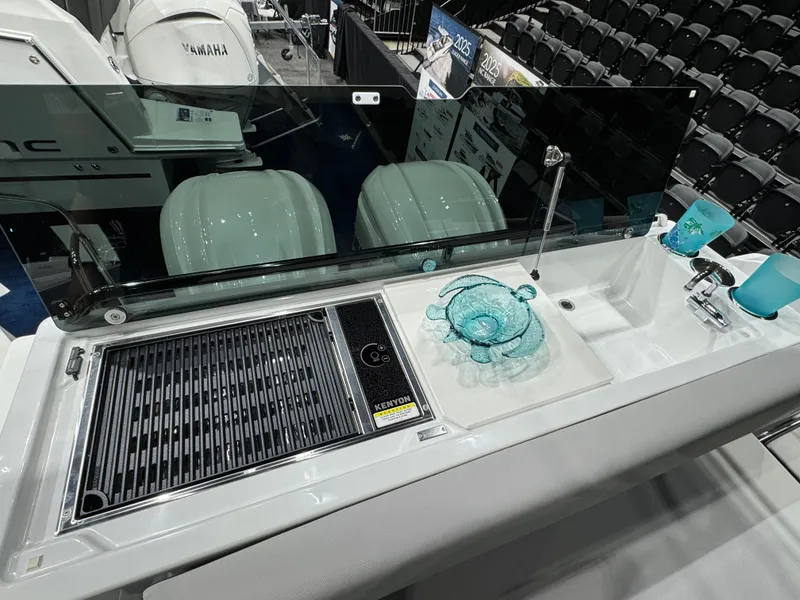 Slide: The Image of 2025 Jeanneau NC 895 Sport Series 2 cabin interior with bed and window view. - 5