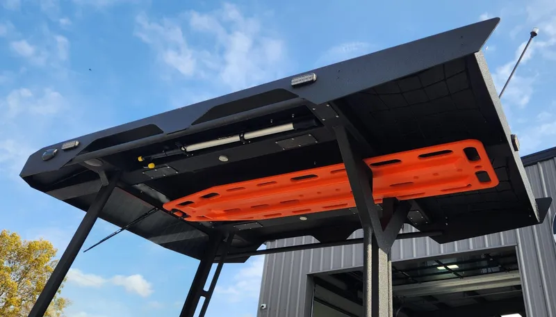 Slide: The Image of 2025 Fluid Watercraft Patrol 26 boat roof with mounted equipment, viewed from below. - 15