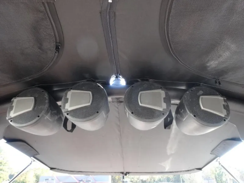 Slide: The Image of Speakers mounted on the ceiling of a 2025 Axis T235 boat. - 10