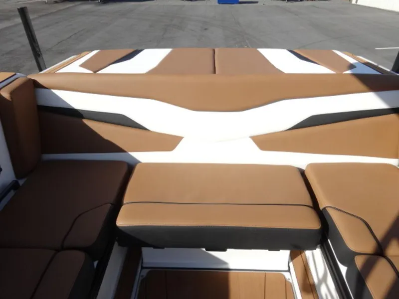 Slide: The Image of 2025 Axis T235 boat interior with brown and white seating. - 12