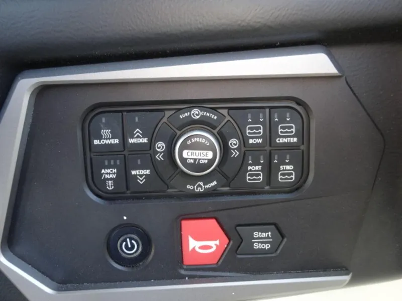 Slide: The Image of Control panel of 2025 Axis T235 boat with various function buttons. - 19