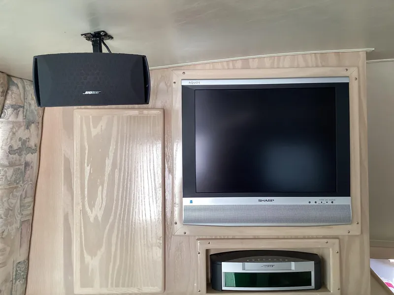 Slide: The Image of Entertainment setup on 2006 Henriques 35 Flybridge with Sharp TV and Bose speaker. - 37