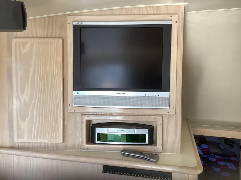 Slide: The Image of Built-in TV and audio system on a 2006 Henriques 35 Flybridge yacht. - 4