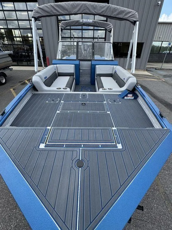 Slide: The Image of 2025 SeaArk Super Lounge Easy boat with spacious seating and modern design. - 10