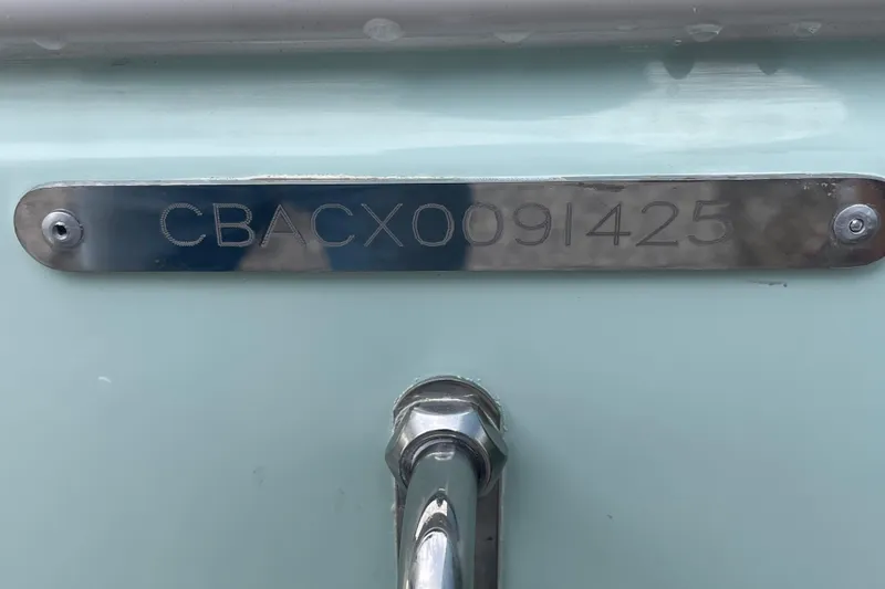 Slide: The Image of 2025 Cobia 220 Center Console boat identification plate with serial number. - 9