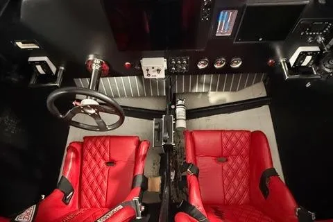 Slide: The Image of Interior of 2019 Phantom SV 32 with red racing seats and steering wheel. - 5