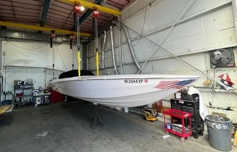 Slide: The Image of 2019 Phantom SV 32 boat in garage, suspended for maintenance. - 8