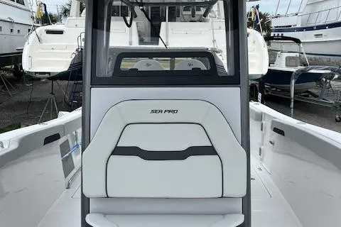 Slide: The Image of 2025 Sea Pro 262 Sport boat interior with sleek seating and modern design. - 12
