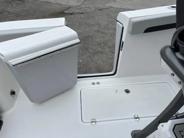 Slide: The Image of 2025 Sea Pro 262 Sport boat interior with storage compartments. - 15