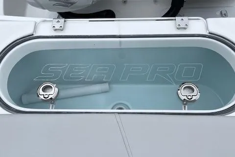 Slide: The Image of 2025 Sea Pro 262 Sport livewell with dual water inlets. - 17