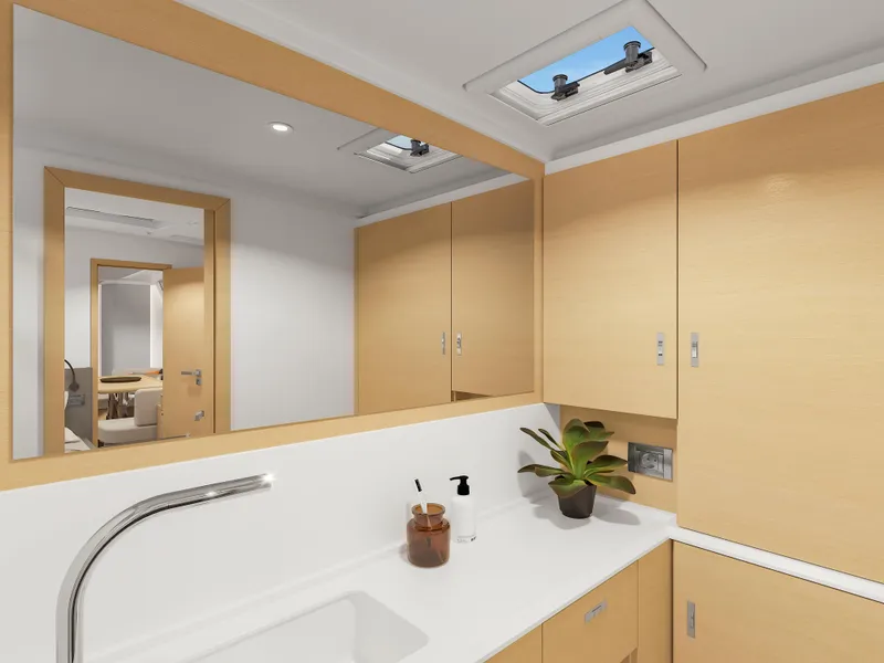 Slide: The Image of Modern bathroom interior on 2025 Hanse 590 yacht, featuring sleek cabinetry and skylight. - 36