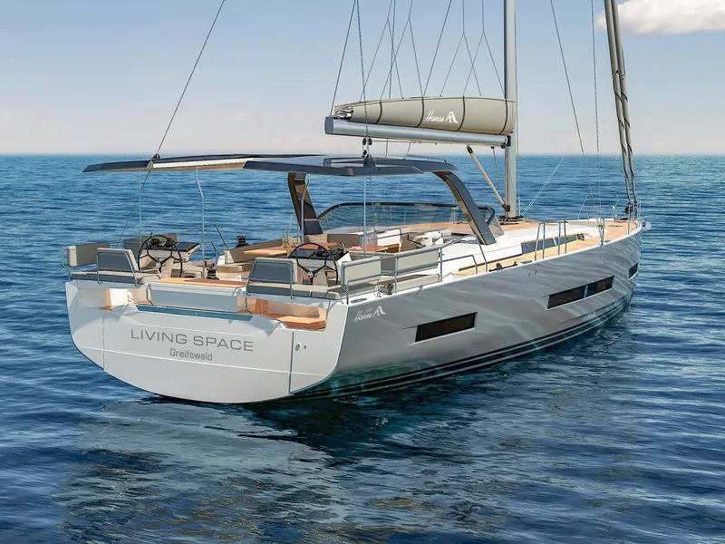 Slide: The Image of 2025 Hanse 590 yacht sailing on open sea, featuring sleek design and spacious deck. - 5