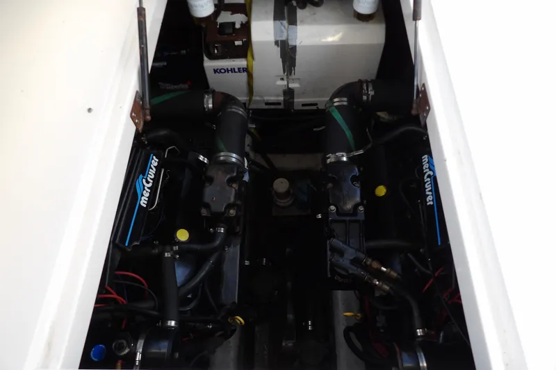 Slide: The Image of Engine compartment of 1998 Wellcraft Martinique 3600 with MerCruiser engines and Kohler generator. - 35