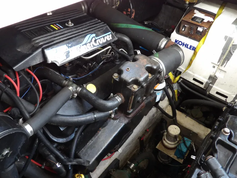 Slide: The Image of 1998 Wellcraft Martinique 3600 engine compartment with MerCruiser and Kohler components. - 37