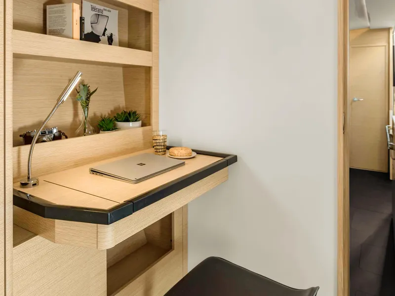 Slide: The Image of Modern bathroom sink area in 2025 Hanse 510 yacht, featuring sleek cabinetry and fixtures. - 15