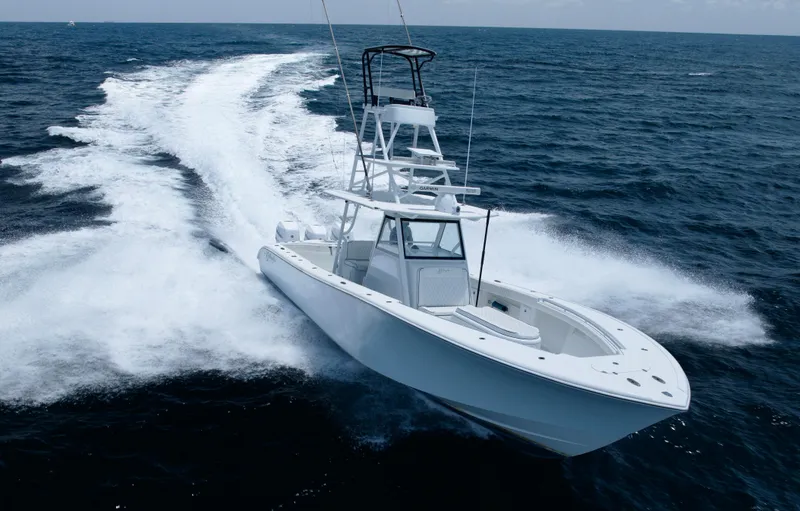 Slide: The Image of 2017 Yellowfin 39 Offshore boat cruising on open ocean waters. - 2