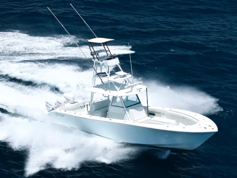 Slide: The Image of 2017 Yellowfin 39 Offshore boat cruising on open ocean waters. - 3
