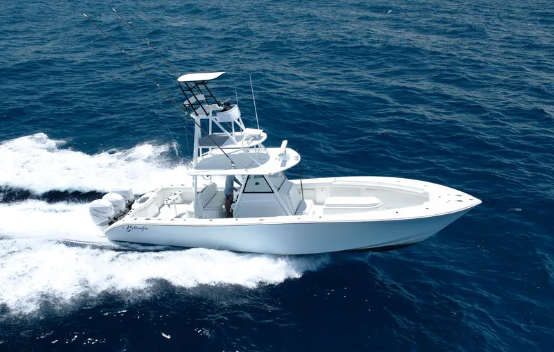 Slide: The Image of 2017 Yellowfin 39 Offshore boat cruising on open ocean waters. - 4