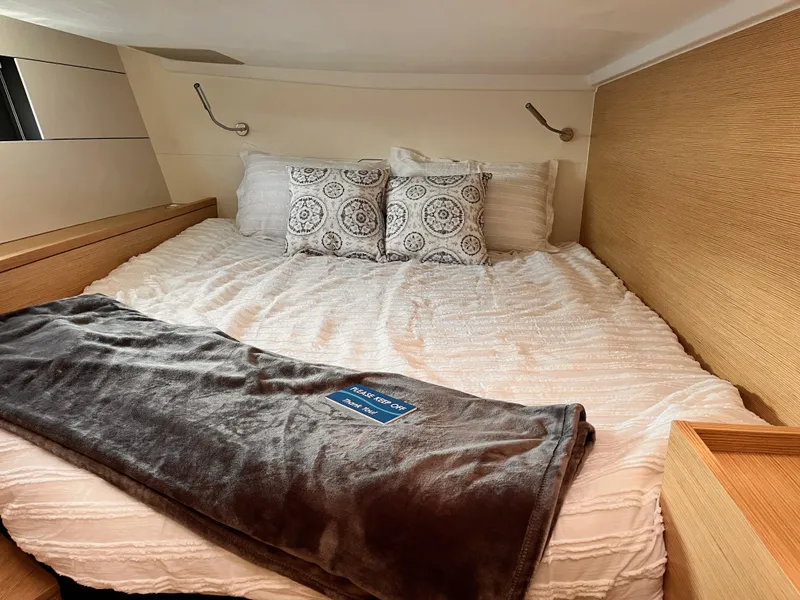 Slide: The Image of Cozy bedroom in 2025 Hanse 460 yacht with modern decor and comfortable bedding. - 22
