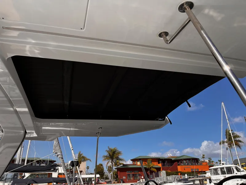 Slide: The Image of Hanse 460 yacht, 2025 model, featuring a sleek design with marina backdrop. - 3