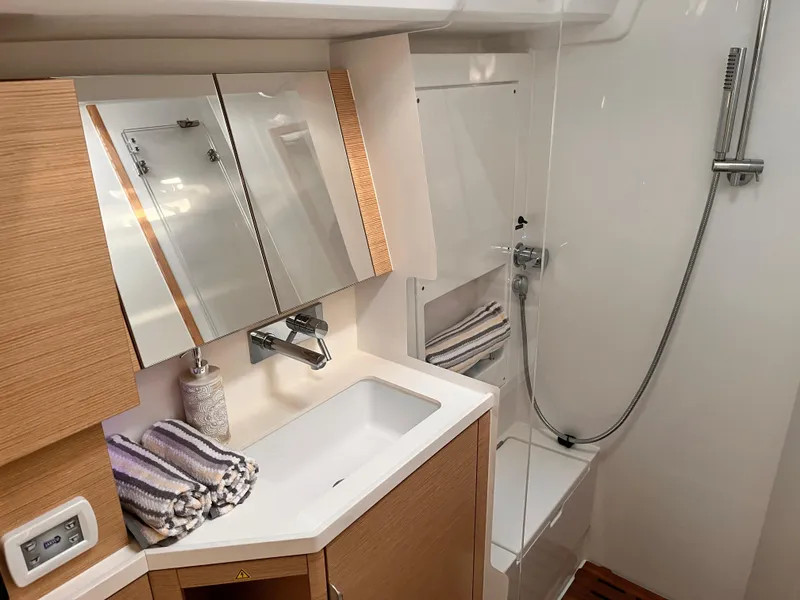 Slide: The Image of Modern bathroom in 2025 Hanse 460 yacht with sleek fixtures and wooden accents. - 30
