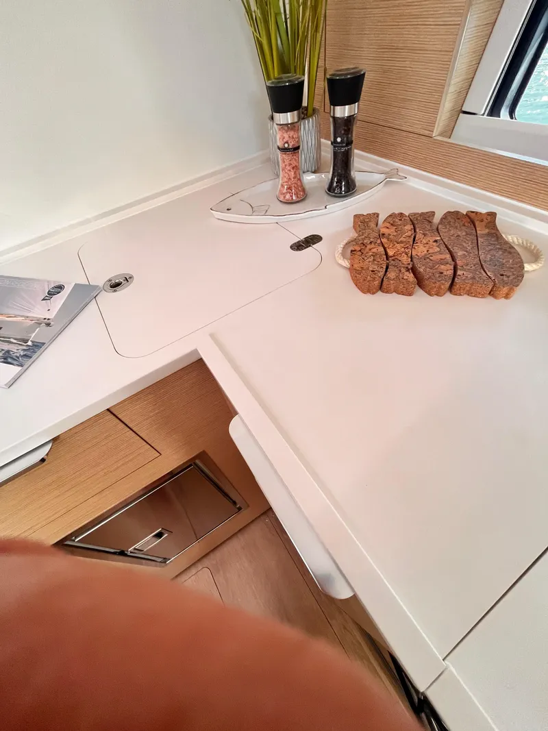 Slide: The Image of Modern kitchen interior of 2025 Hanse 460 yacht with countertop and bread. - 32