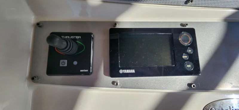 Slide: The Image of Control panel of 2013 Chris-Craft Catalina 29 Sun Tender with Yamaha display and thruster joystick. - 12