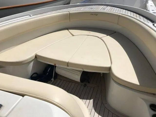 Slide: The Image of 2013 Chris-Craft Catalina 29 Sun Tender with beige seating and wooden deck. - 17