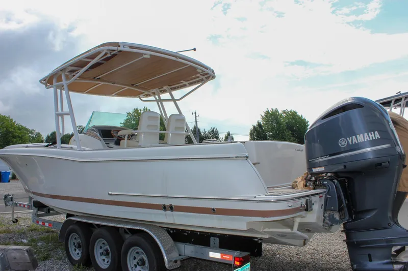 Slide: The Image of 2013 Chris-Craft Catalina 29 Sun Tender on trailer with Yamaha outboard motor. - 21