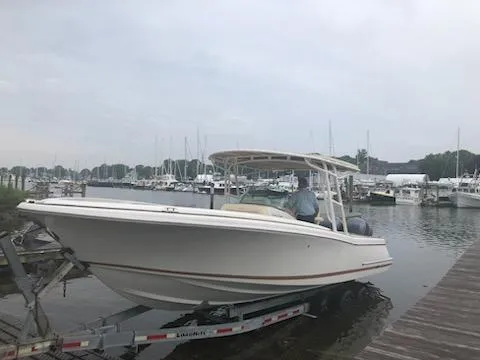 Slide: The Image of 2013 Chris-Craft Catalina 29 Sun Tender on trailer by marina dock. - 4