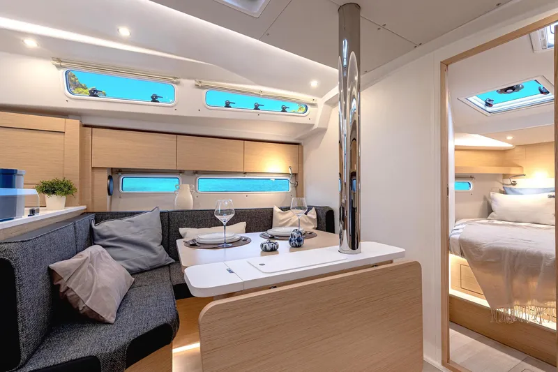 Slide: The Image of Modern Hanse 360 yacht deck, 2025 model, featuring dual steering wheels and sleek seating. - 24