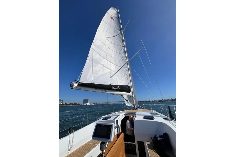 Slide: The Image of 2026 Hanse 360 sailboat on open water under clear blue sky. - 39