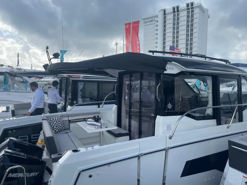 Slide: The Image of 2025 Jeanneau NC 895 Series 2 boat at marina, featuring sleek design and modern amenities. - 2