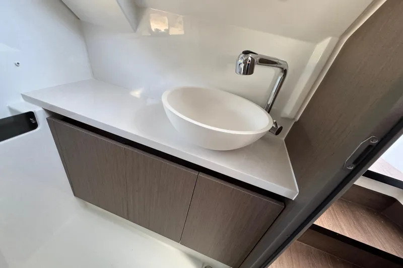 Slide: The Image of Modern bathroom sink in 2026 Jeanneau NC 895 Series 2 boat interior. - 25