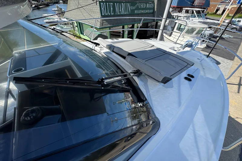 Slide: The Image of 2026 Jeanneau NC 895 Series 2 boat with sleek design at marina. - 35