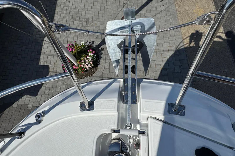 Slide: The Image of Bow view of 2026 Jeanneau NC 895 Series 2 boat with anchor and flowers. - 37