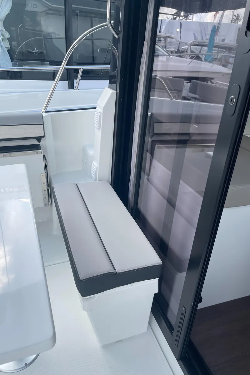 Slide: The Image of 2026 Jeanneau NC 895 Series 2 boat kitchen with stove and sink, modern design. - 7