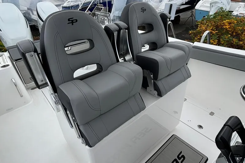 Slide: The Image of 2025 Sea Pro 292 DLX boat seats, featuring sleek gray design and modern comfort. - 14