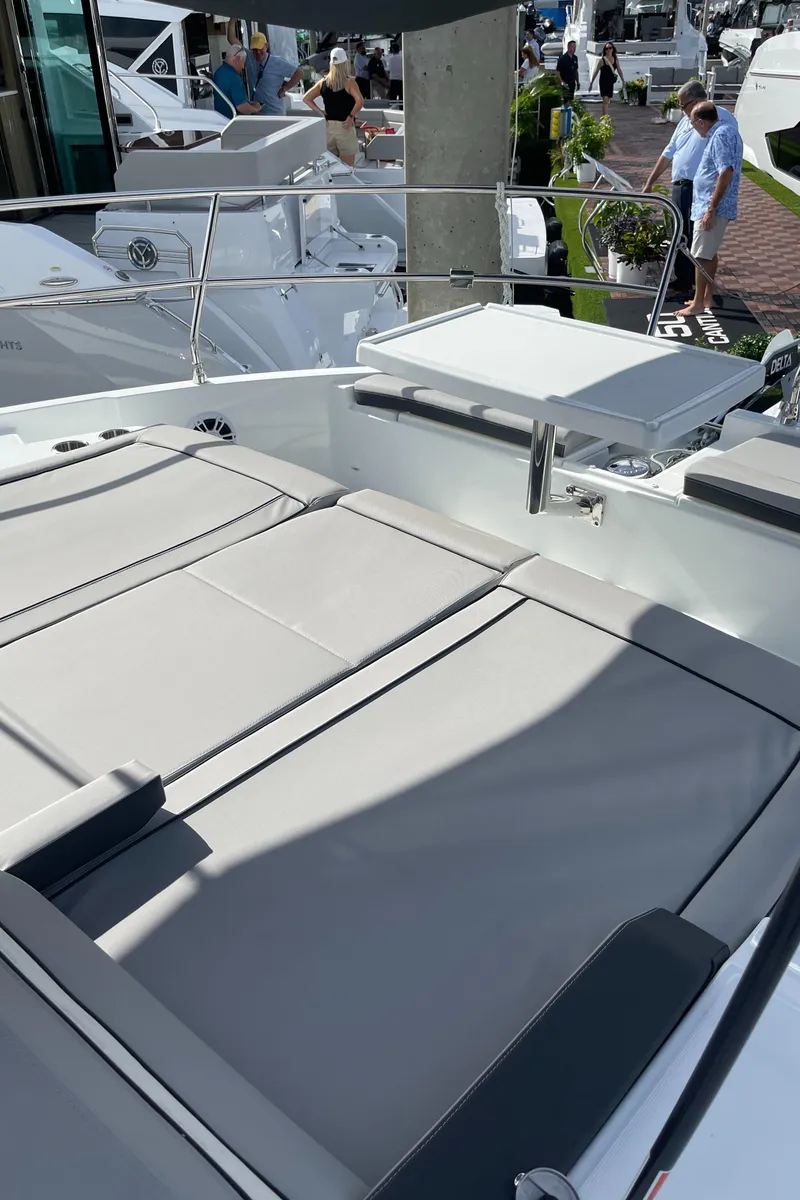 Slide: The Image of 2025 Jeanneau NC 1295 Coupe boat with spacious sunbathing deck. - 23