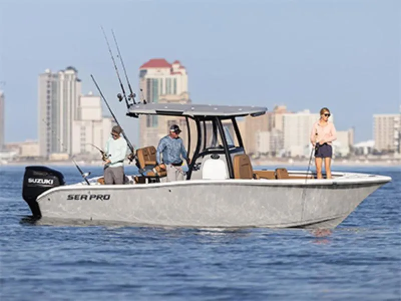 Slide: The Image of 2025 Sea Pro 245 FLX boat on water with city skyline in background. - 0