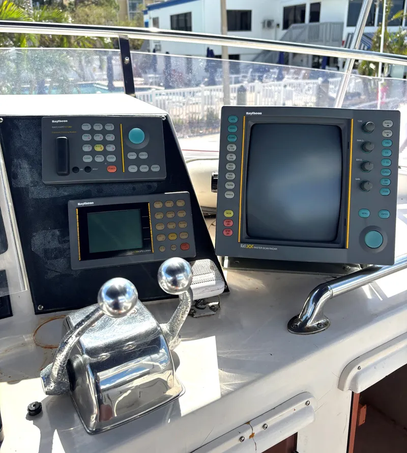 Slide: The Image of Control panel of 1988 Marine Trader Tradewinds 43 Motor Yacht with navigation equipment. - 20