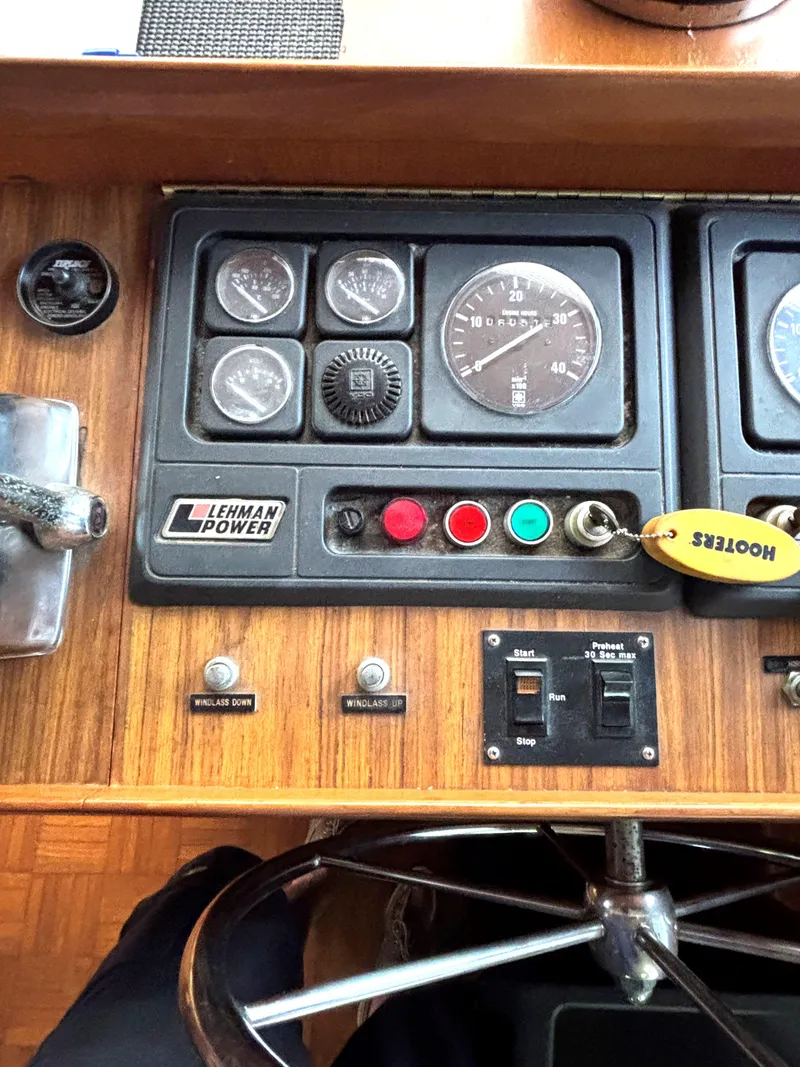 Slide: The Image of Dashboard of 1988 Marine Trader Tradewinds 43 Motor Yacht with Lehman Power controls. - 37