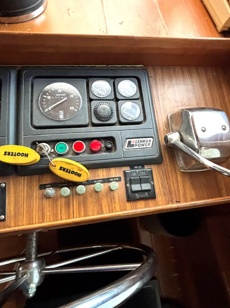 Slide: The Image of Dashboard of 1988 Marine Trader Tradewinds 43 Motor Yacht with Lehman Power controls. - 38