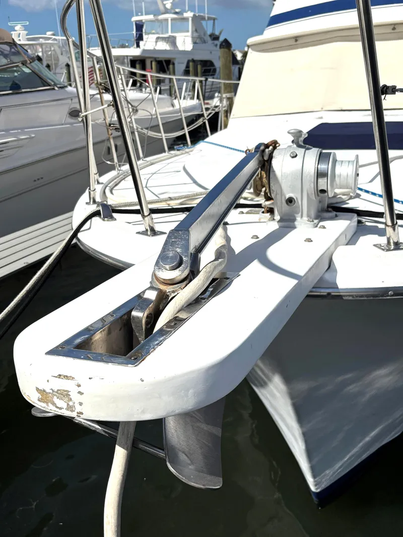 Slide: The Image of 1988 Marine Trader Tradewinds 43 Motor Yacht anchor detail at marina. - 4