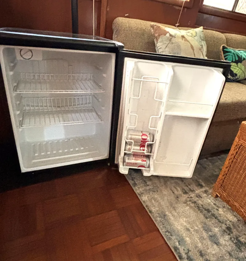 Slide: The Image of Open mini fridge in 1988 Marine Trader Tradewinds 43 Motor Yacht interior. - 40